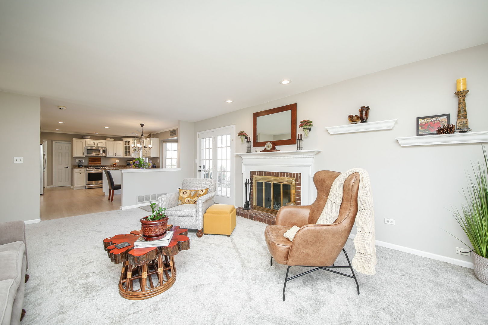 230 Hill Road Willowbrook, IL 60527 - Photo 7 of 39 a living room with furniture fireplace and a flat screen tv