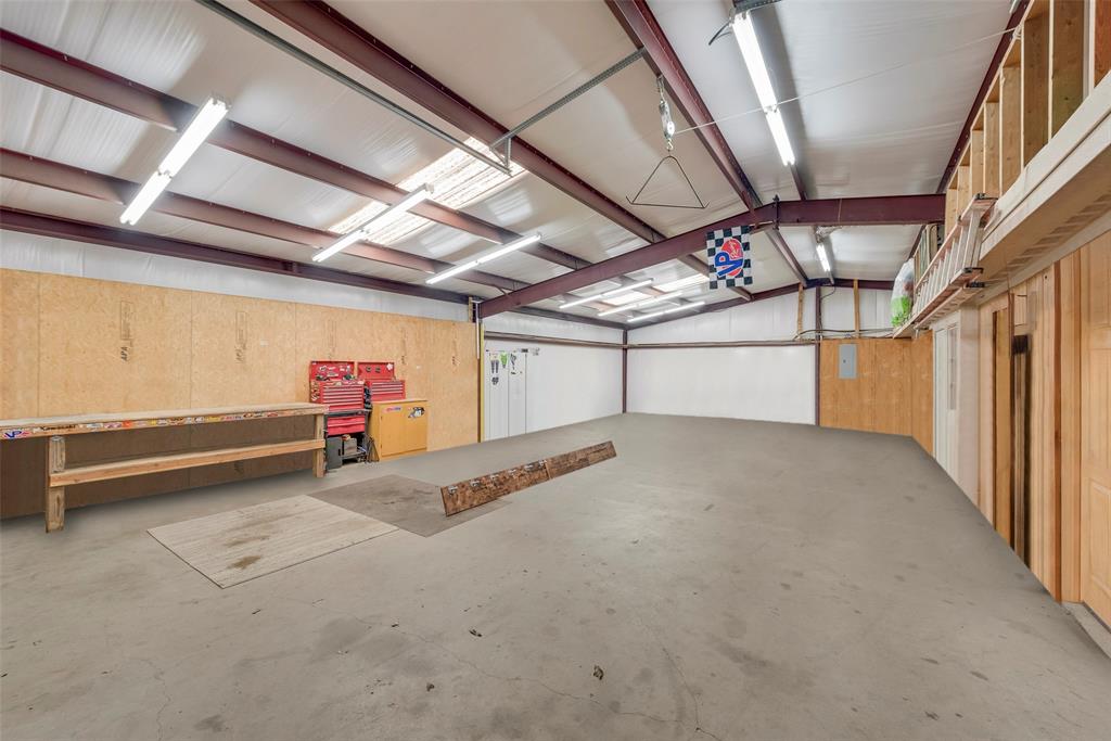 8636 Highway 31 Athens, TX 75751 - Photo 11 of 22 a view of a room with wooden walls
