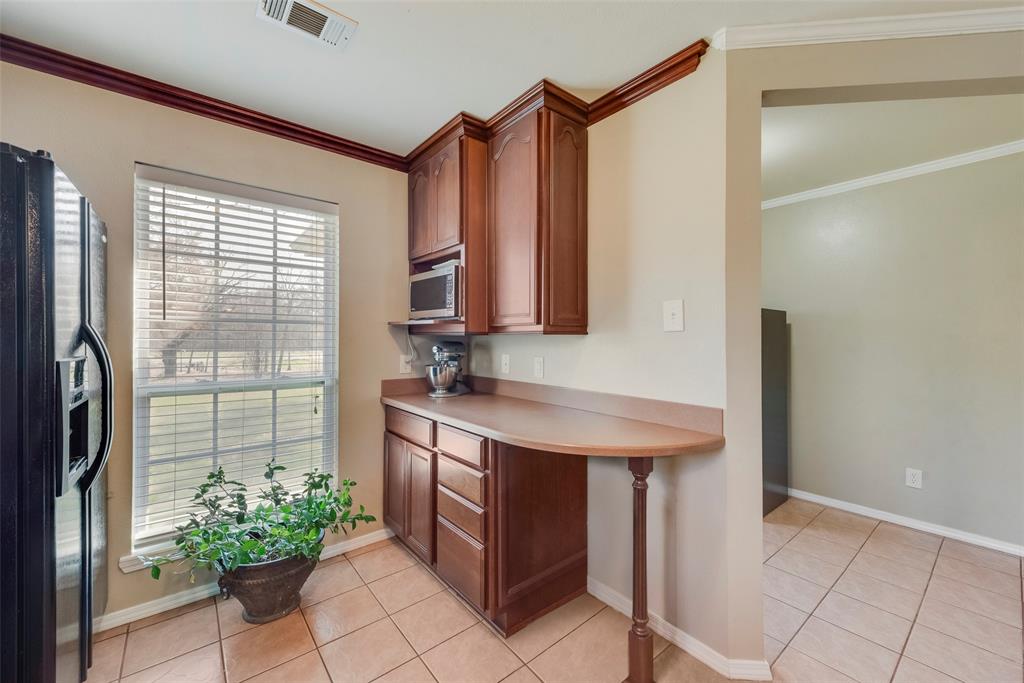 8636 Highway 31 Athens, TX 75751 - Photo 2 of 22 a bathroom with a sink a mirror and a shower