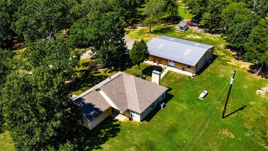 8636 Highway 31 Athens, TX 75751 - Photo 22 of 22 an aerial view of a house with a backyard space