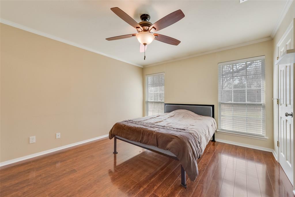 8636 Highway 31 Athens, TX 75751 - Photo 7 of 22 a bedroom with a bed and a table