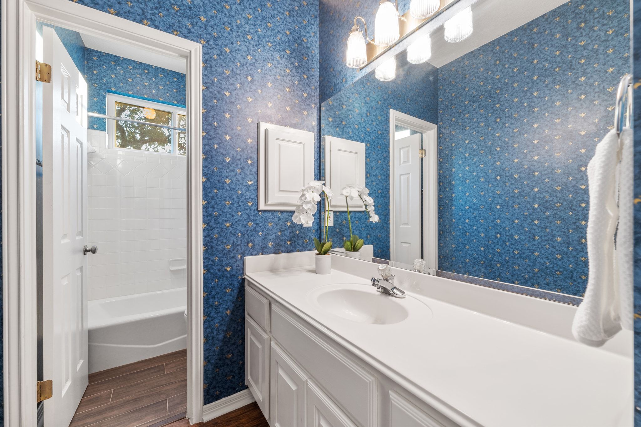 5100 Hadle Cove Austin, TX 78730 - Photo 14 of 31 The downstairs full bathroom next to the guest bedroom/office.