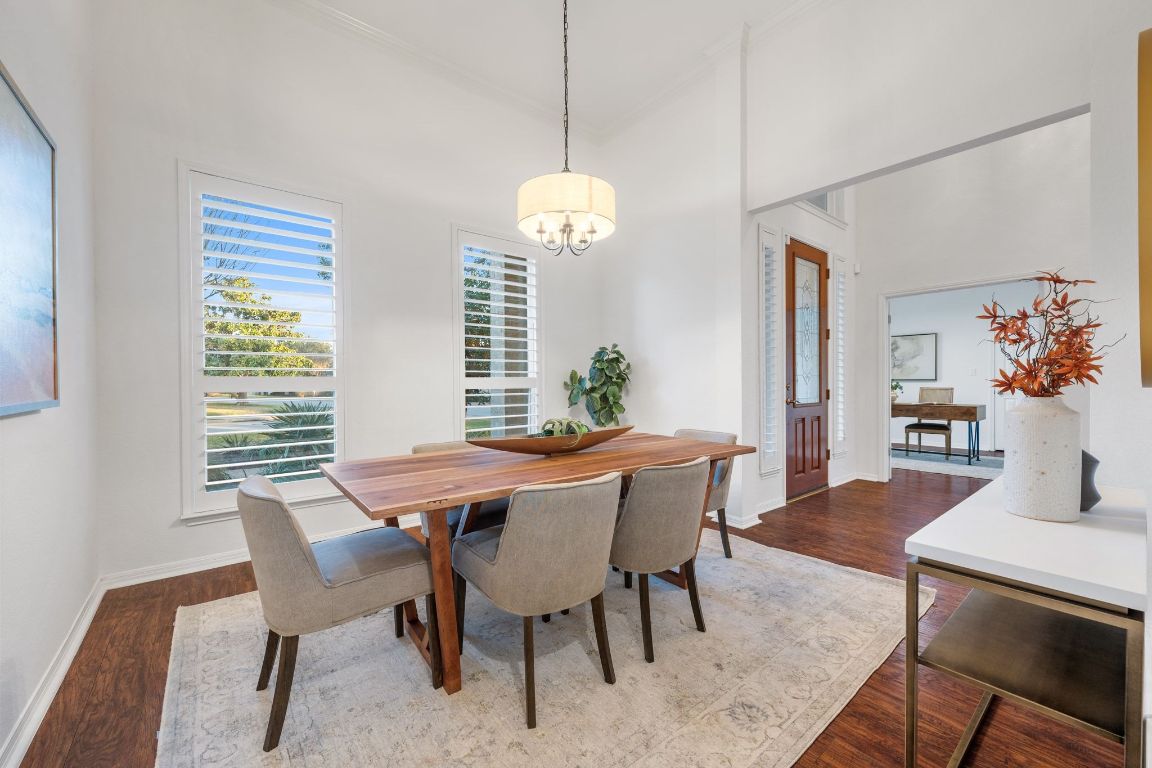 5100 Hadle Cove Austin, TX 78730 - Photo 3 of 32 The formal dining room is spacious, which is situated off the entry and looks out the front of the house, is the perfect place for family meals and dinner parties.