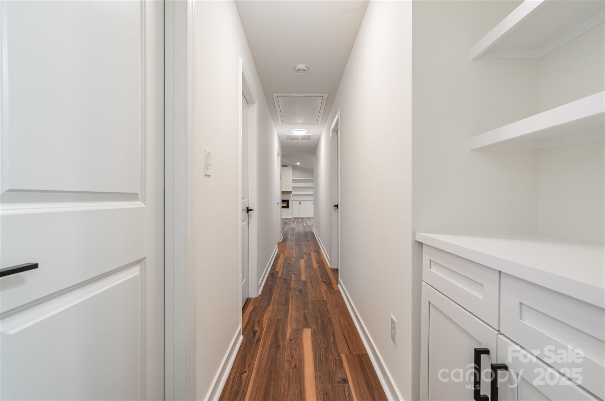 4169 Stack Road Harrisburg, NC 28075 - Photo 11 of 29 a view of a hallway with wooden floor and staircase