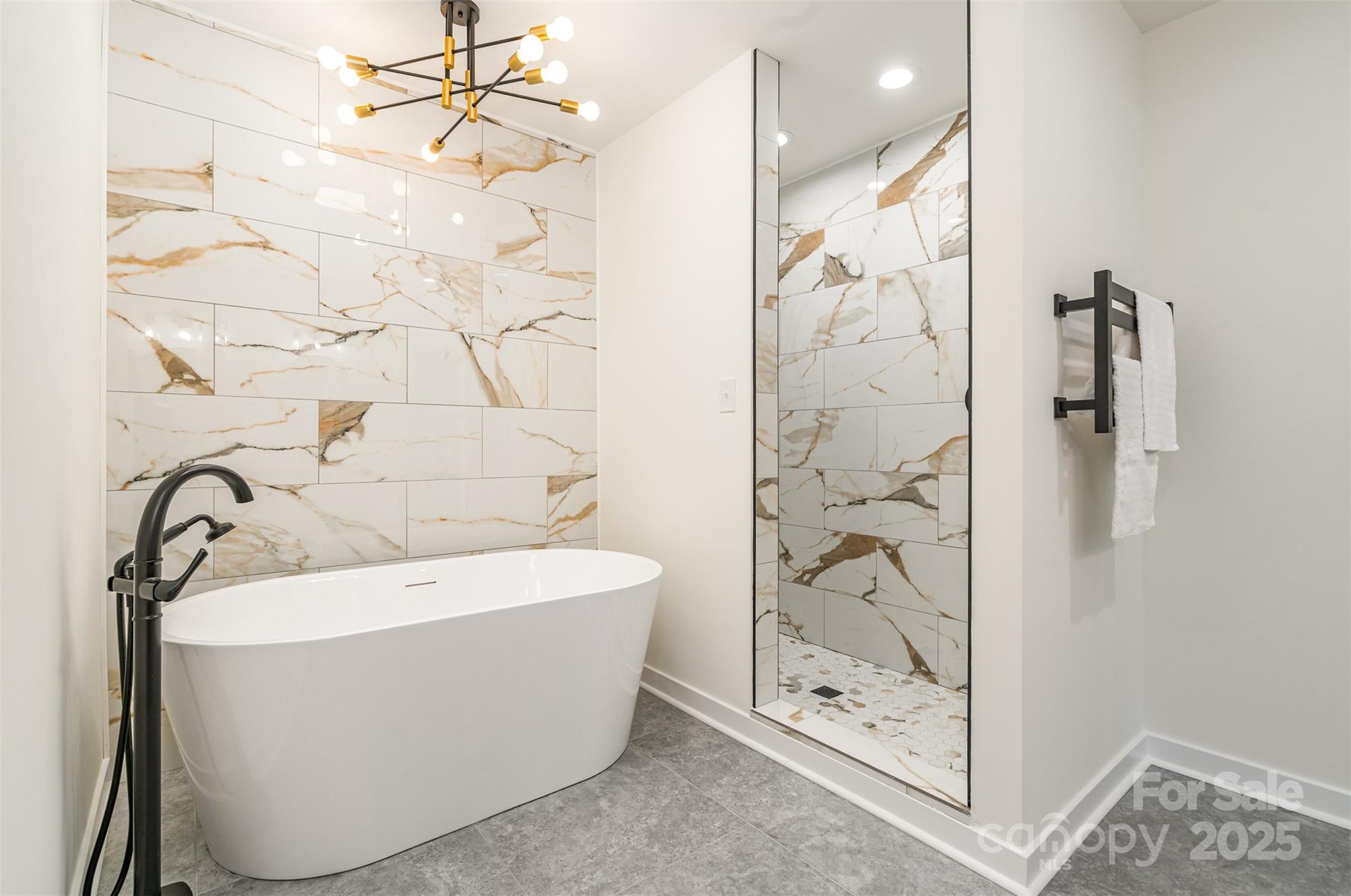 4169 Stack Road Harrisburg, NC 28075 - Photo 17 of 29 a bathroom with a bathtub and shower