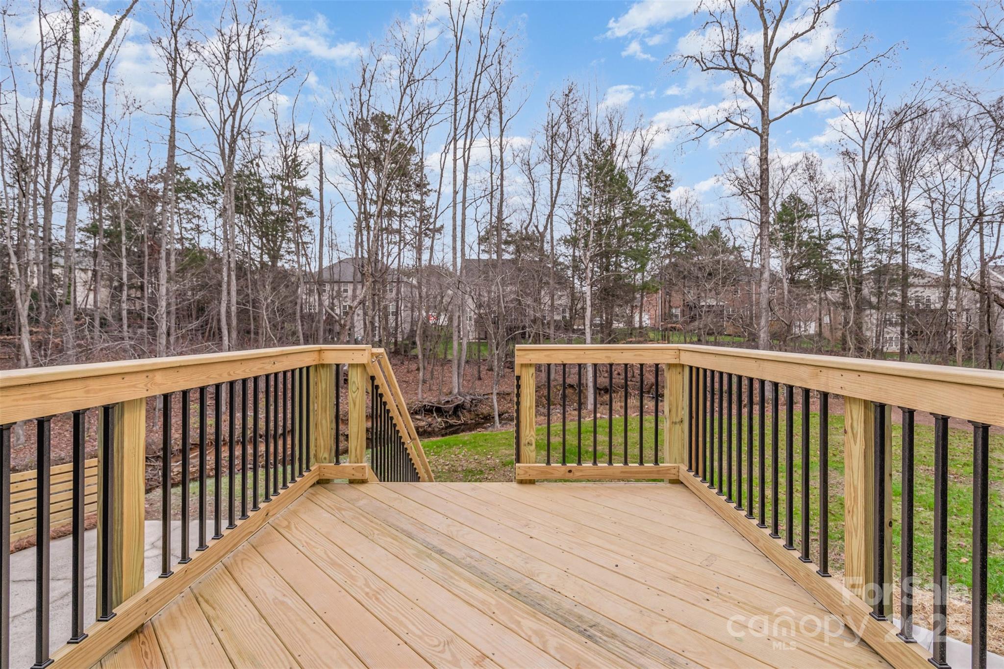 4169 Stack Road Harrisburg, NC 28075 - Photo 24 of 29 a view of a wooden deck