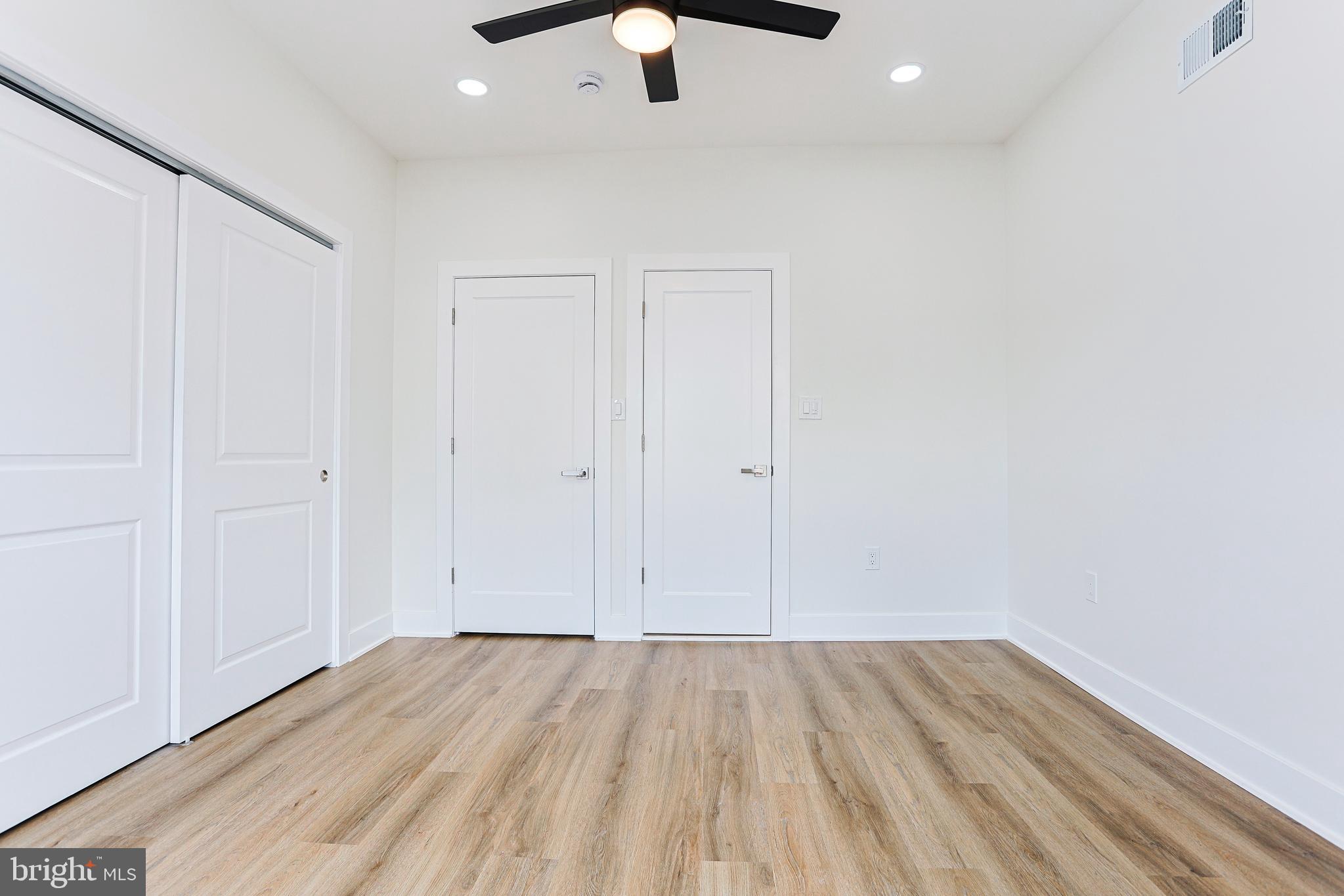 5520 Pemberton Street Philadelphia, PA 19143 - Photo 21 of 28 a view of an empty room with wooden floor