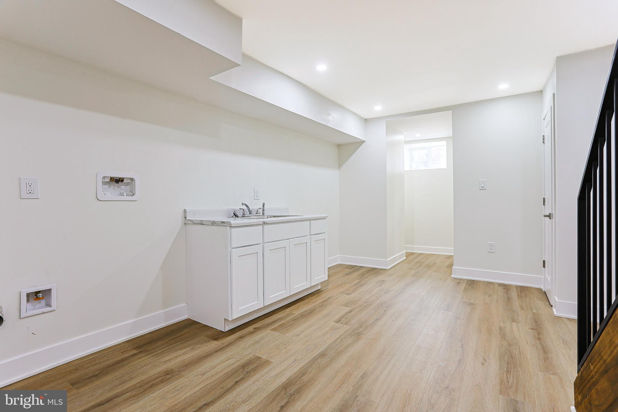 5520 Pemberton Street Philadelphia, PA 19143 - Photo 27 of 28 an empty room with wooden floor