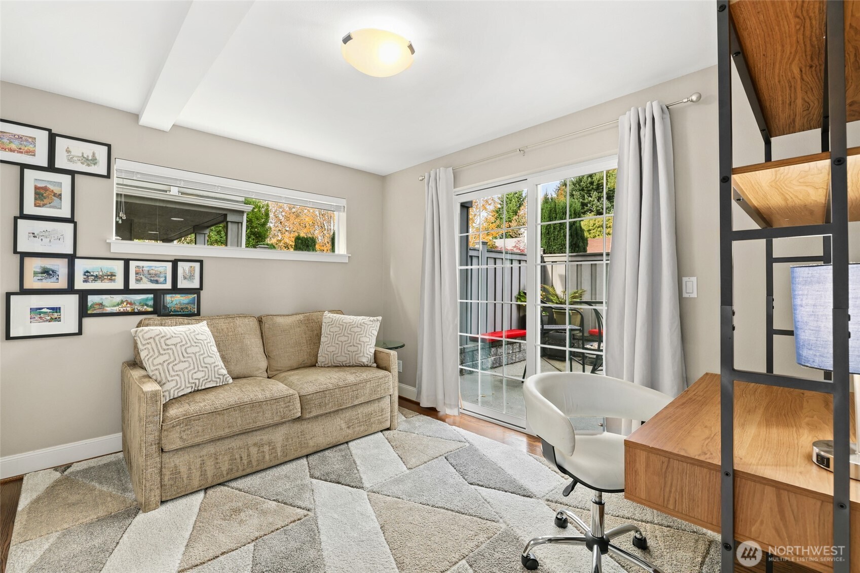 4535 Northeast 55th Street Seattle, WA 98105 - Photo 2 of 27 a living room with furniture and a window