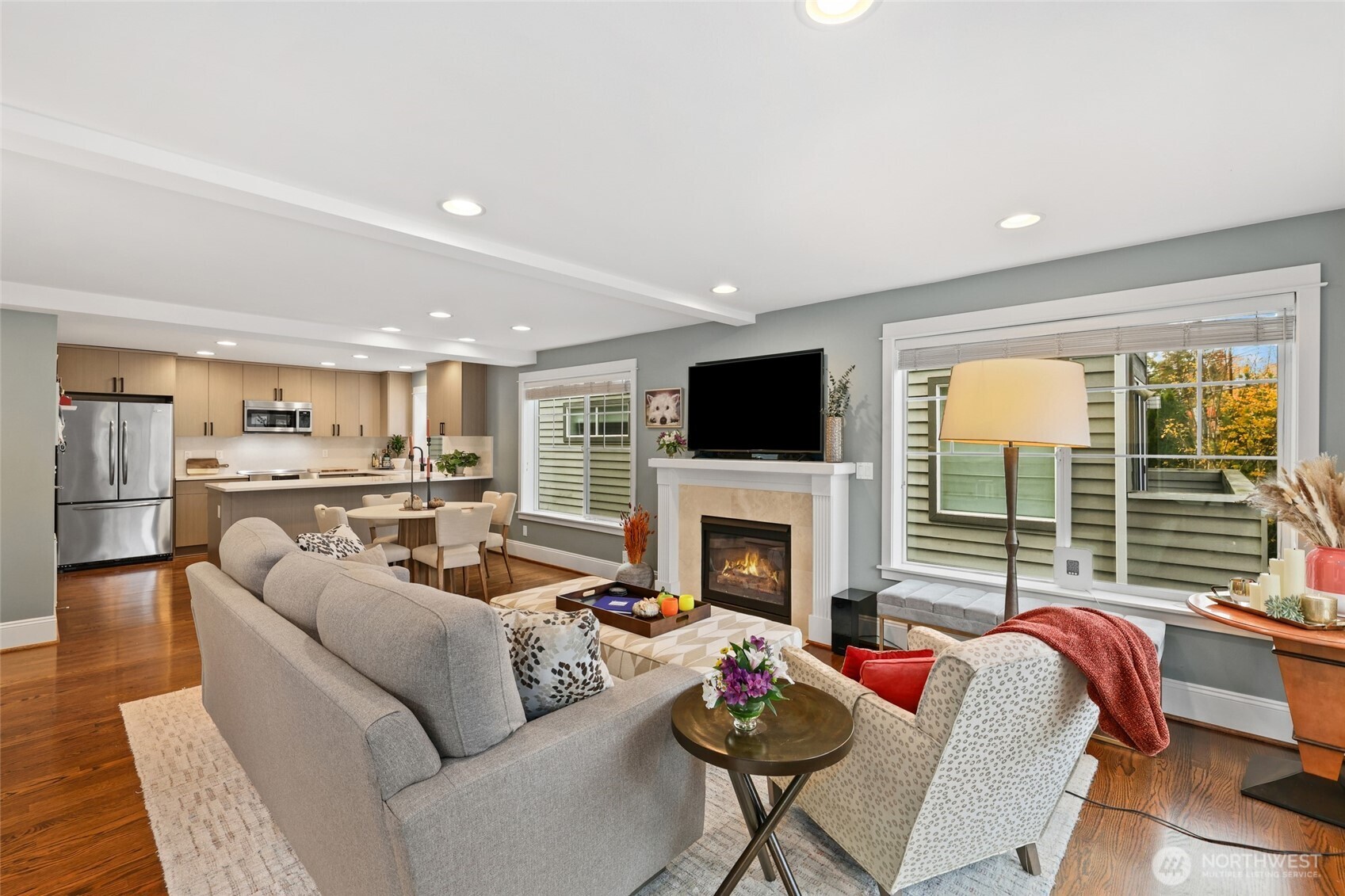 4535 Northeast 55th Street Seattle, WA 98105 - Photo 5 of 27 a living room with furniture and a fireplace