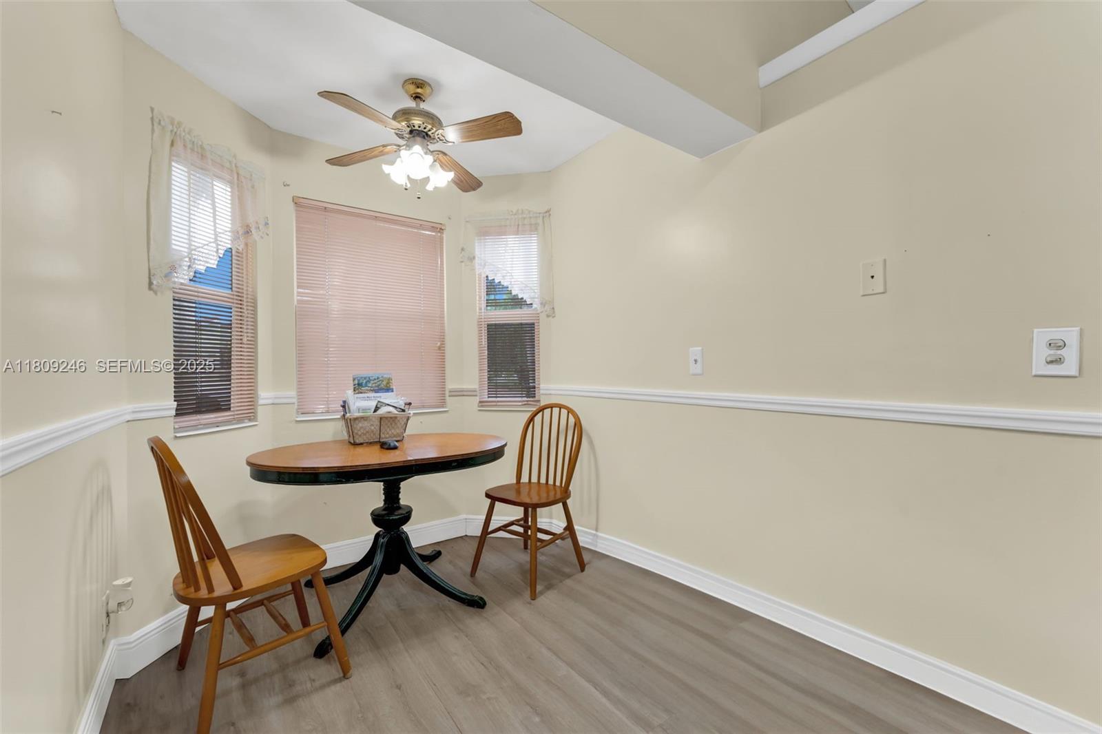 10813 Southwest 158th Lane Miami, FL 33157 - Photo 16 of 27 a dining room with furniture and window