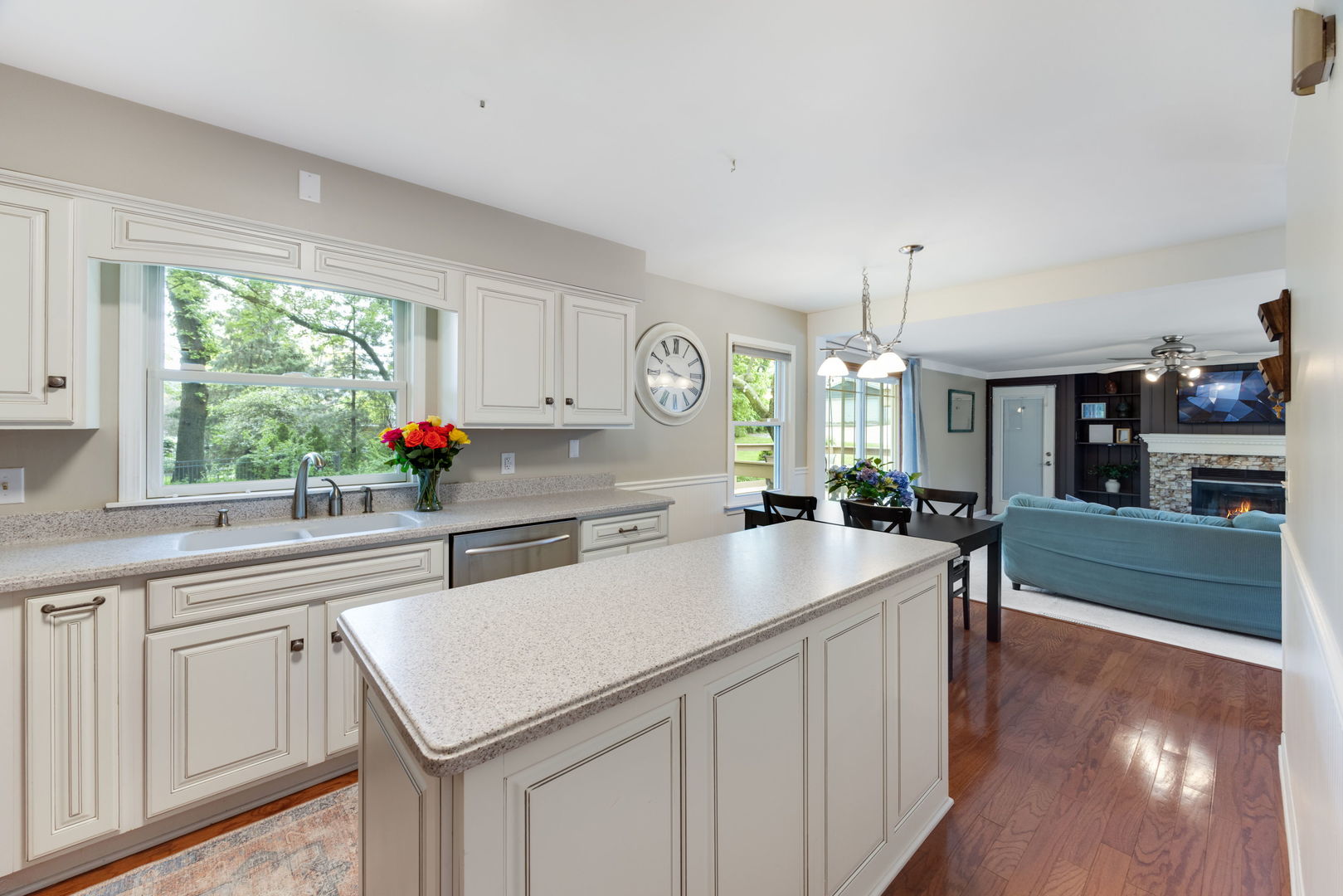 4N285 LaFox Road St. Charles, IL 60175 - Photo 4 of 17 a kitchen with a sink a center island and cabinets