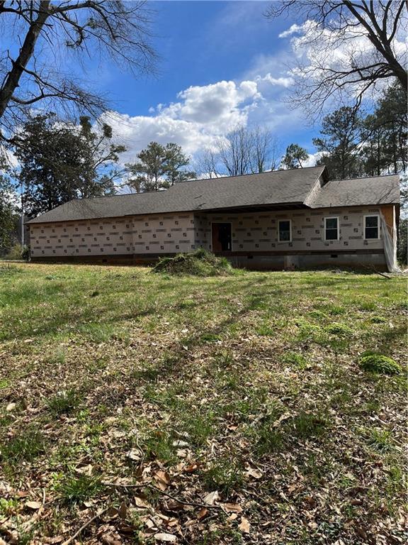 a house view with a garden space