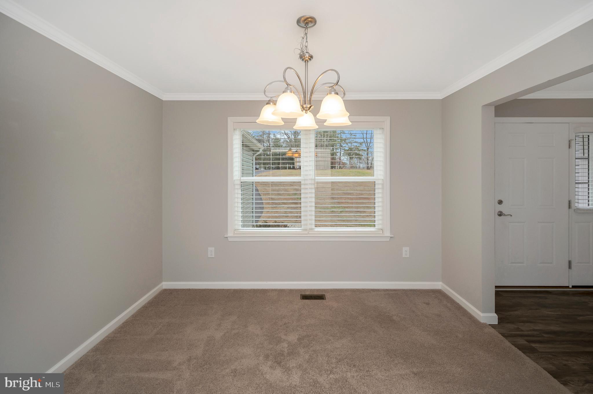 6112 Eds Road Mineral, VA 23117 - Photo 19 of 39 a view of an empty room with a window