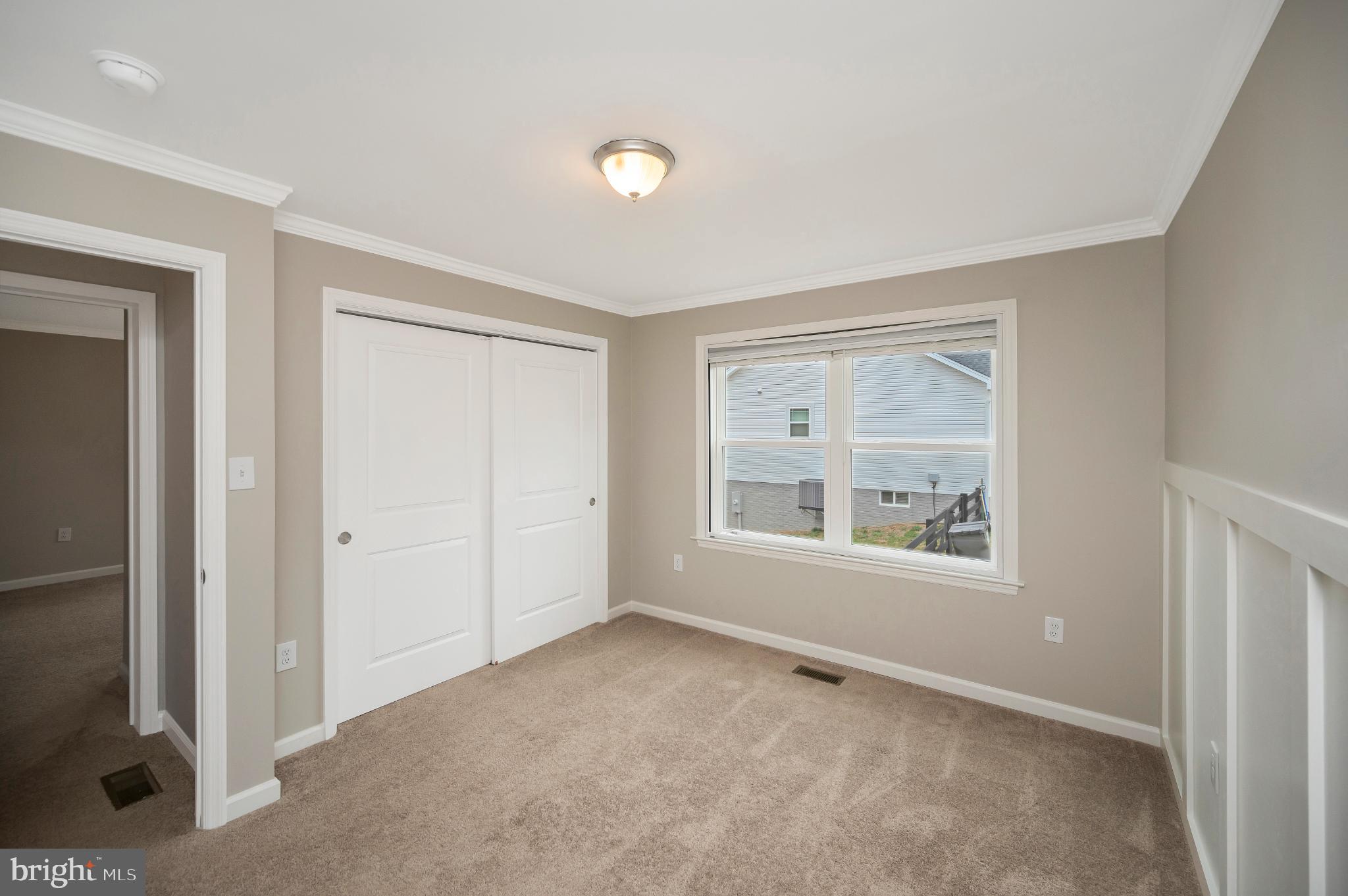6112 Eds Road Mineral, VA 23117 - Photo 27 of 39 an empty room with windows and closet