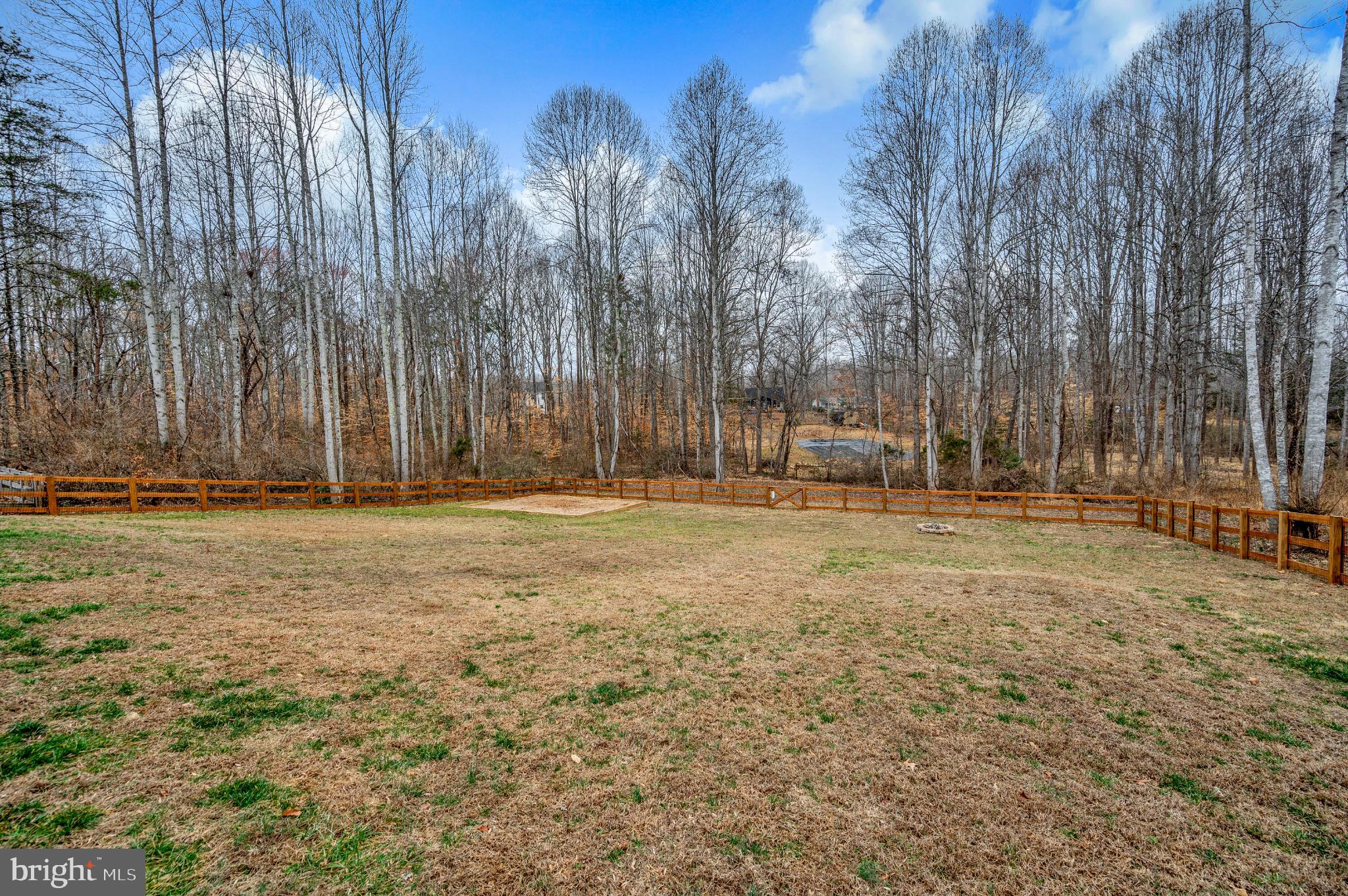 6112 Eds Road Mineral, VA 23117 - Photo 32 of 39 a backyard of a house with lots of green space