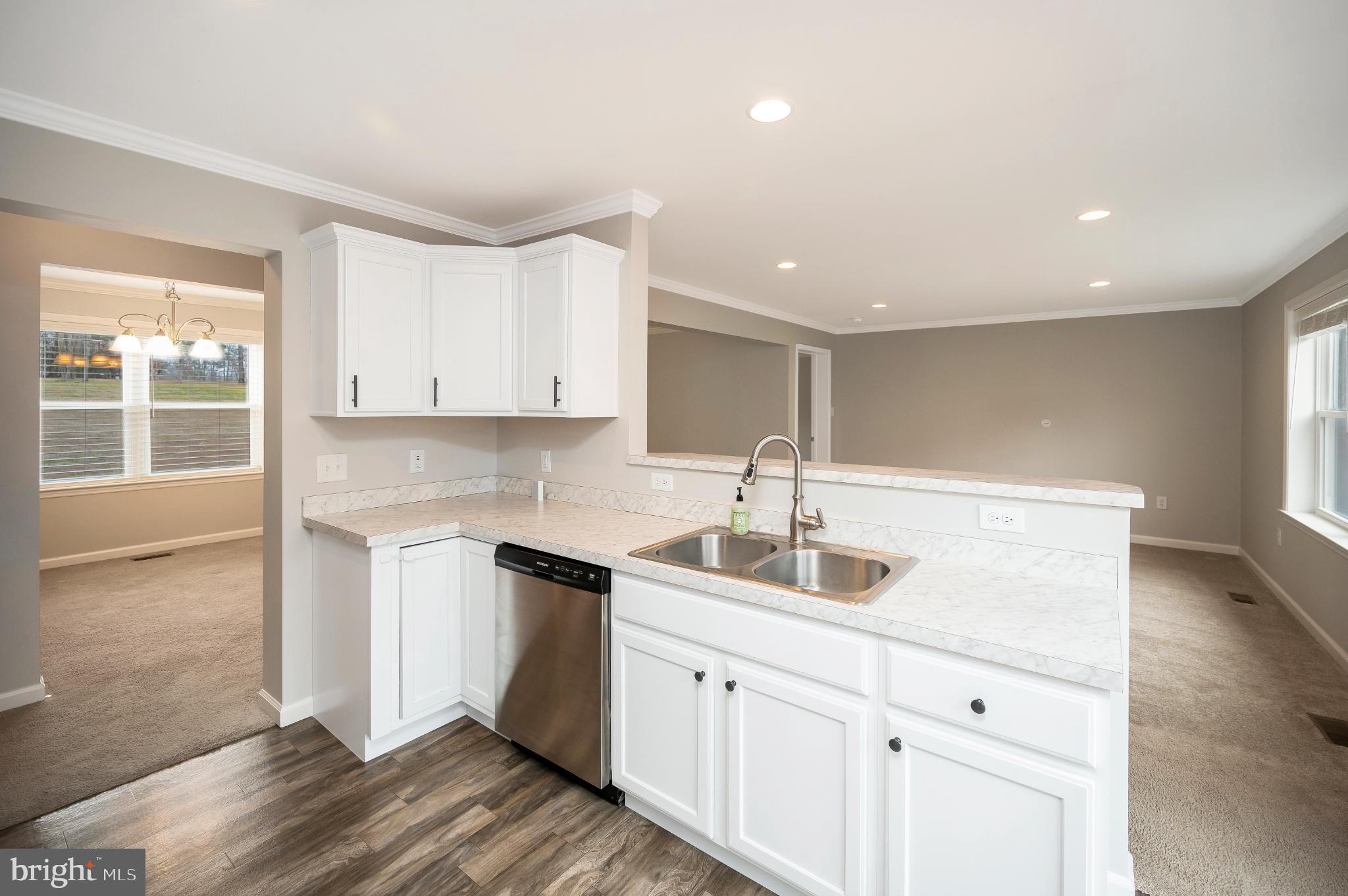 6112 Eds Road Mineral, VA 23117 - Photo 8 of 39 a kitchen with a sink cabinets and window