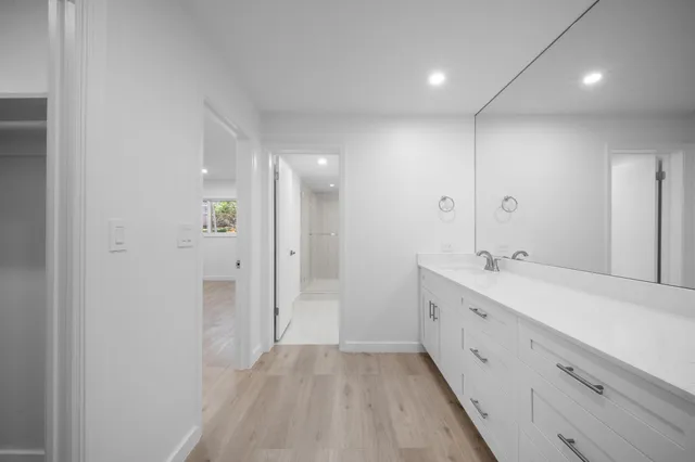 an aerial view of a house with a garden