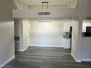 7885 West Flamingo Road, Unit 2004 Las Vegas, NV 89147 - Photo 11 of 23 This versatile space offers an open-concept design with durable flooring, ready for your personal touch.