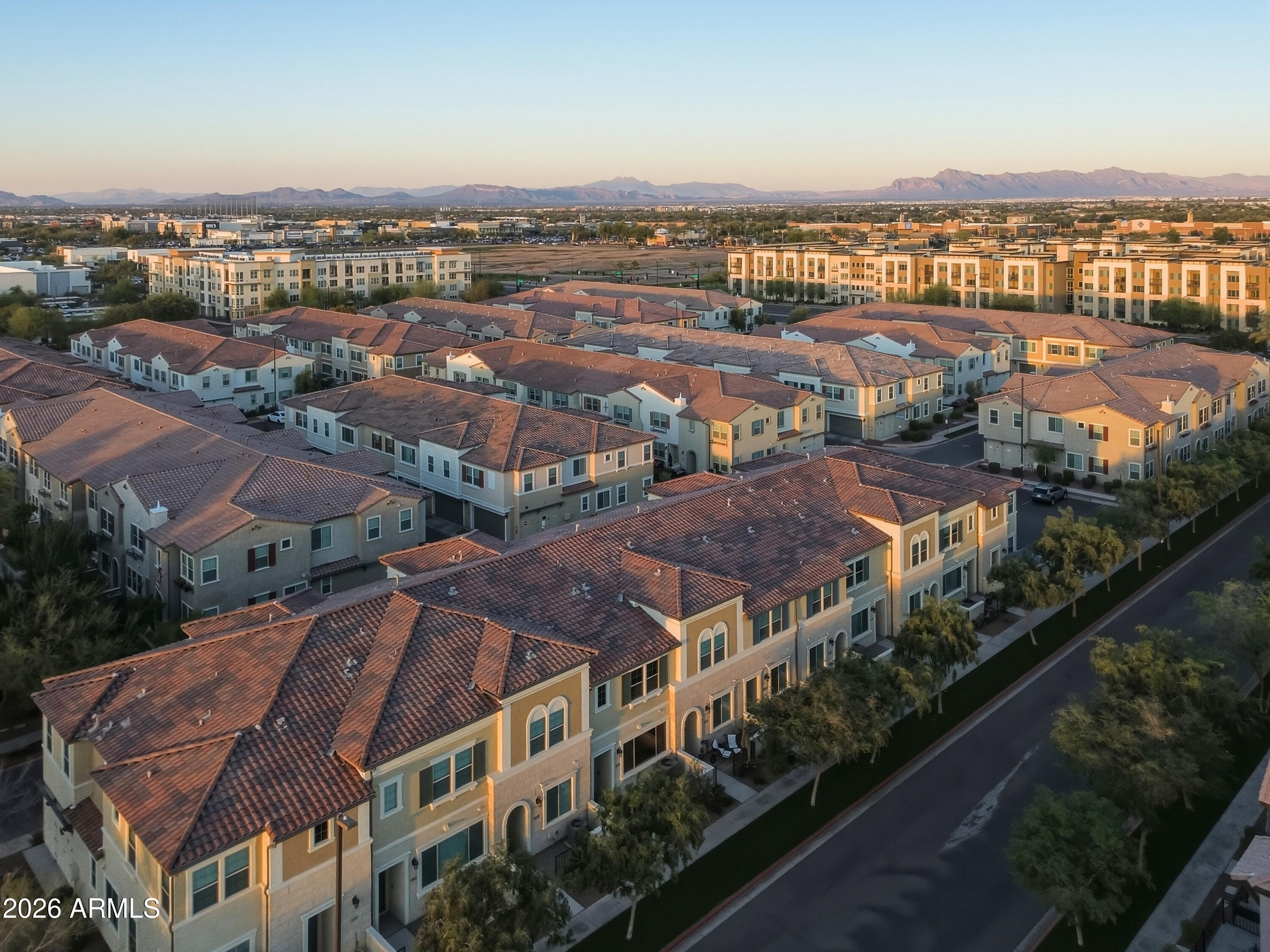 1917 East Hampton Lane, Unit 106 Gilbert, AZ 85295 - Photo 22 of 25 an aerial view of residential houses with outdoor space and swimming pool