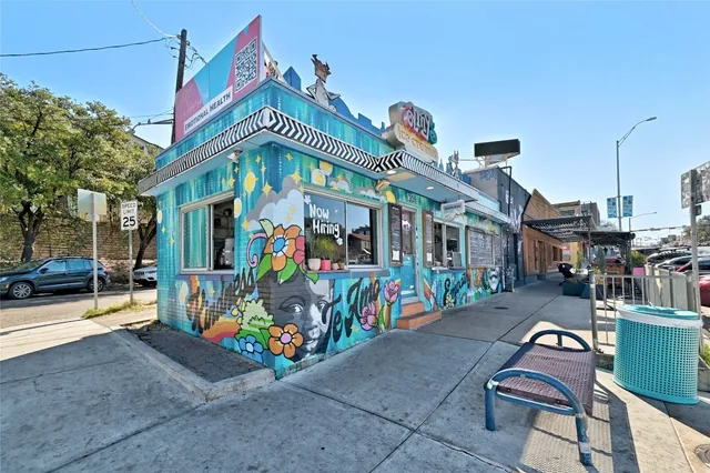a view of street with sitting area