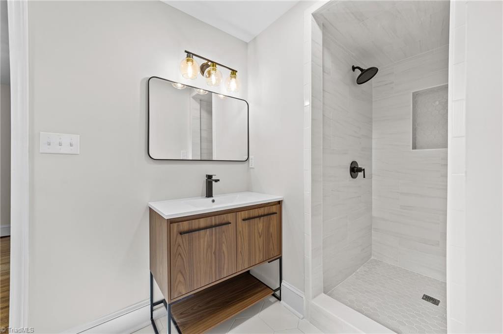 209 Edgedale Drive High Point, NC 27262 - Photo 30 of 40 Upstairs Bedroom #3/Primary Bath