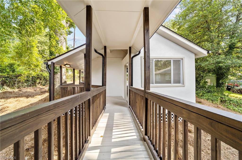 209 Edgedale Drive High Point, NC 27262 - Photo 34 of 40 Walkway to house from carport