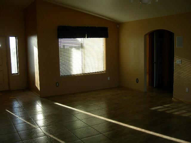 980 North Hilton Road Apache Junction, AZ 85119 - Photo 6 of 12 a view of an empty room with a window