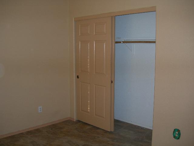 980 North Hilton Road Apache Junction, AZ 85119 - Photo 8 of 12 an empty room with closet area
