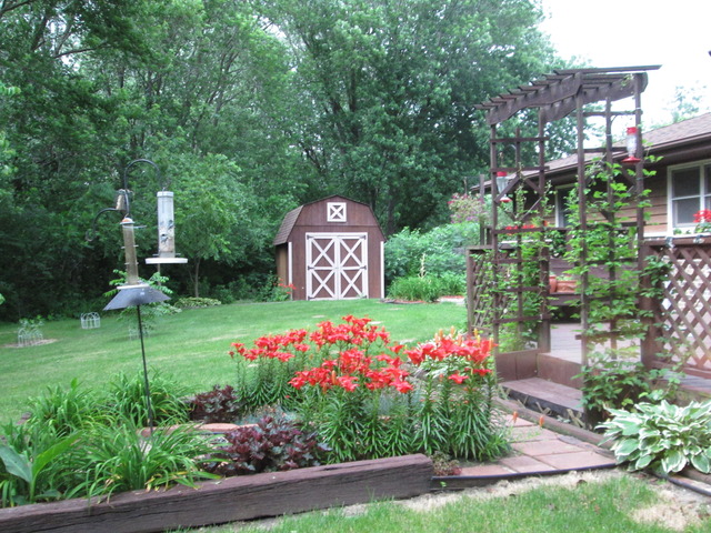 600 Schoolgate Road New Lenox, IL 60451 - Photo 20 of 24 a sign that is sitting in front of flowers