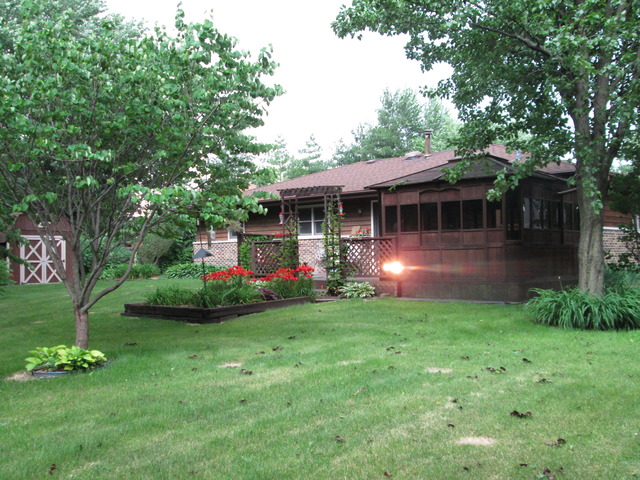 600 Schoolgate Road New Lenox, IL 60451 - Photo 24 of 24 a view of a house with a backyard and a patio