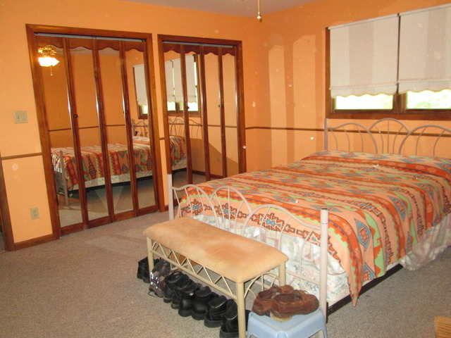 600 Schoolgate Road New Lenox, IL 60451 - Photo 9 of 24 a bedroom with a bed and a window
