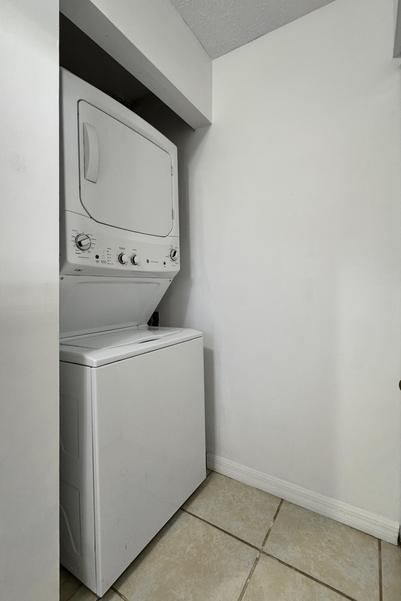 6541 Southeast Federal Highway, Unit 101 Stuart, FL 34997 - Photo 12 of 30 a utility room with dryer and washer
