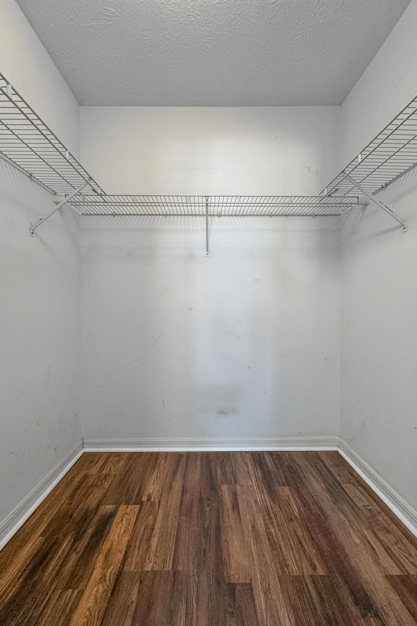 6541 Southeast Federal Highway, Unit 101 Stuart, FL 34997 - Photo 19 of 30 a view of a room with wooden floor