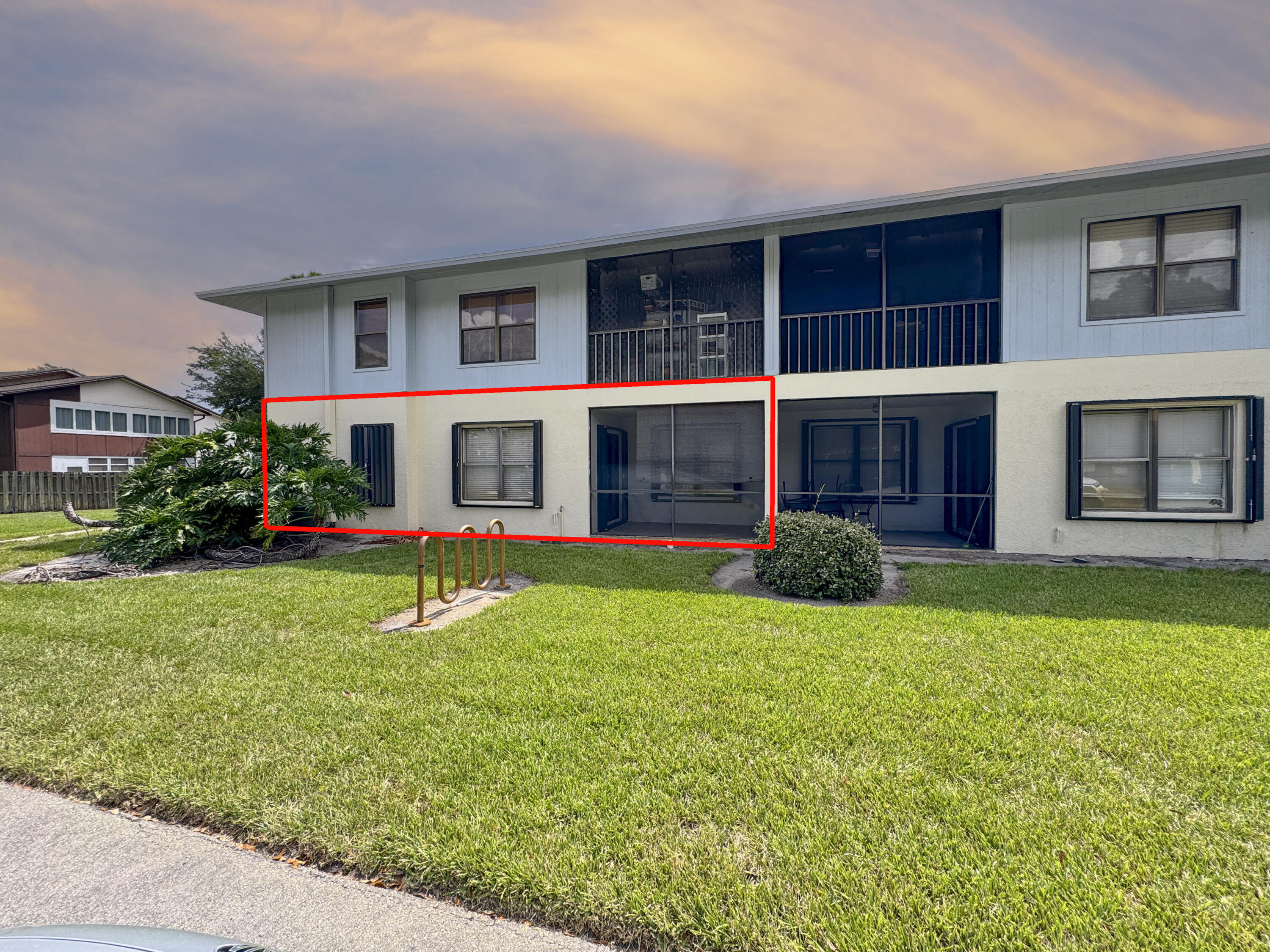 6541 Southeast Federal Highway, Unit 101 Stuart, FL 34997 - Photo 22 of 30 a view of an house with backyard space and balcony