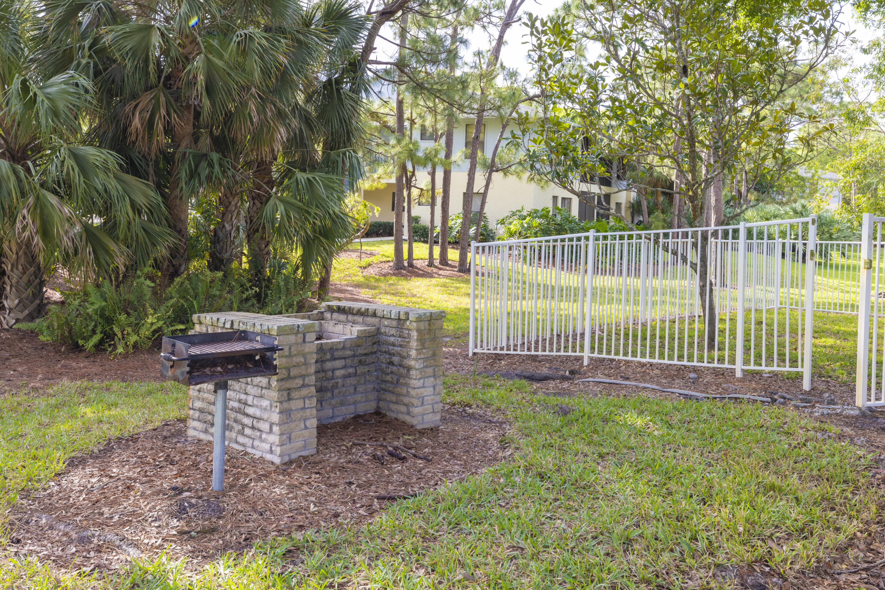 6541 Southeast Federal Highway, Unit 101 Stuart, FL 34997 - Photo 27 of 30 a view of a park with large trees