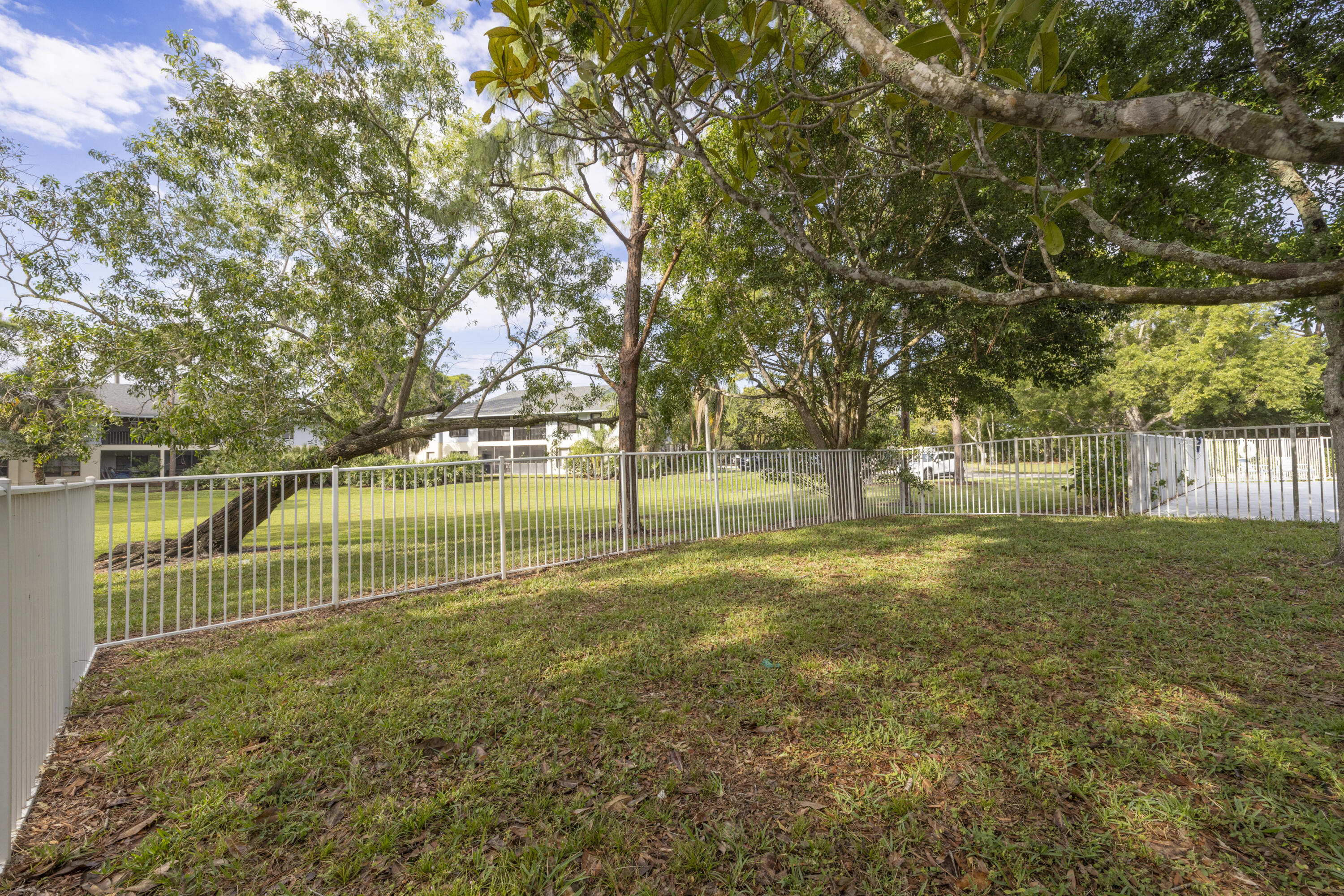 6541 Southeast Federal Highway, Unit 101 Stuart, FL 34997 - Photo 28 of 30 a view of yard with green space