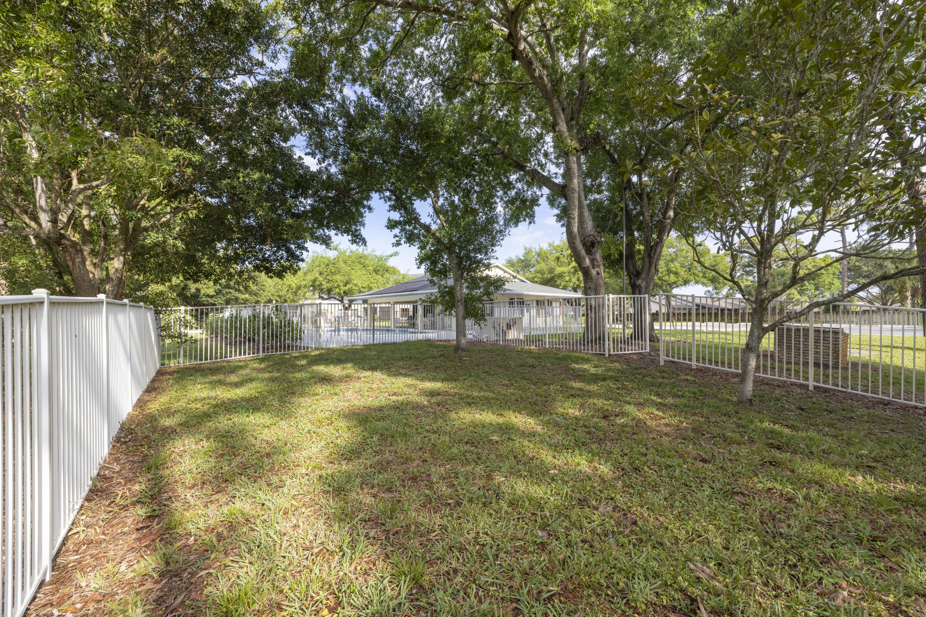 6541 Southeast Federal Highway, Unit 101 Stuart, FL 34997 - Photo 29 of 30 a view of yard with trees