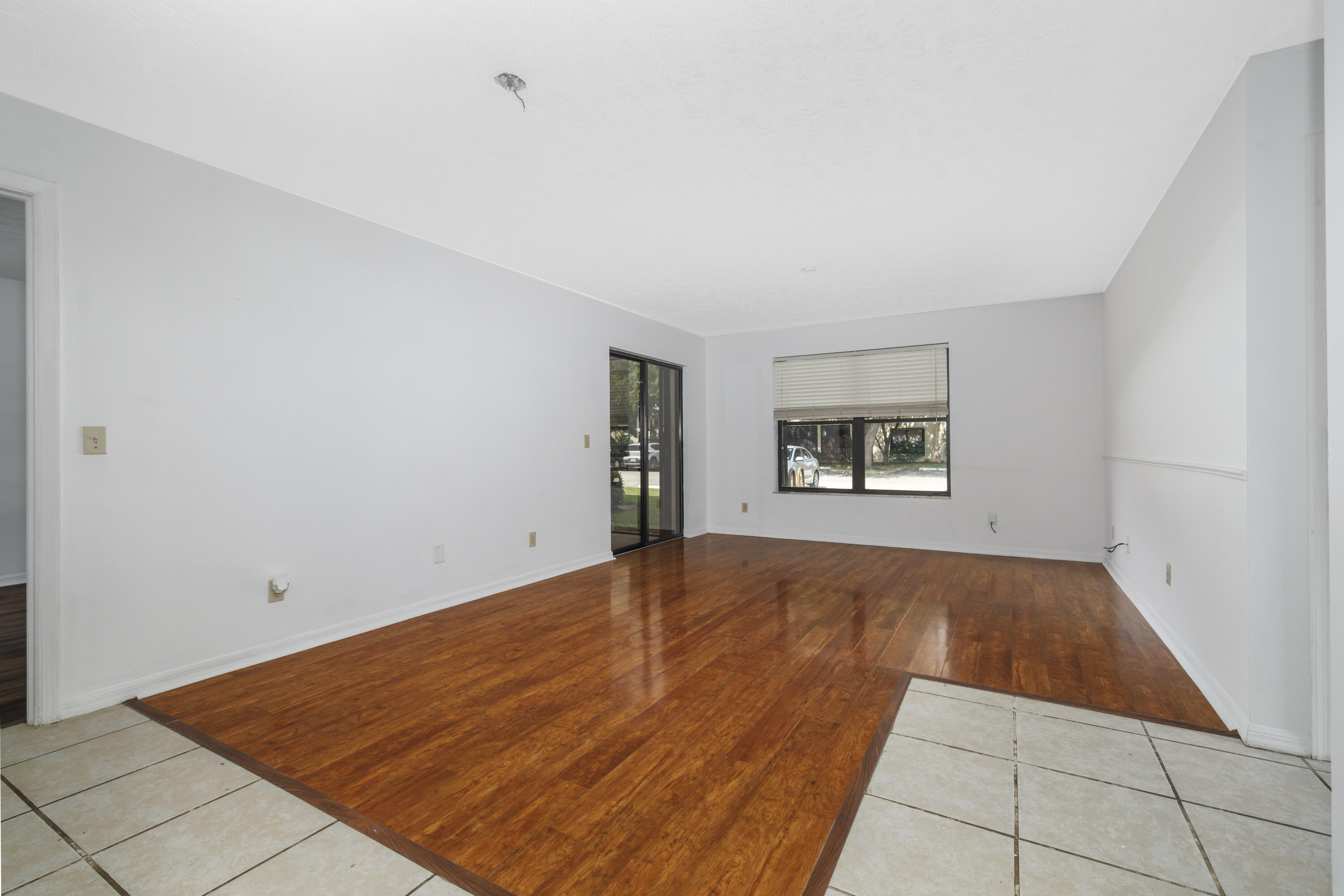 6541 Southeast Federal Highway, Unit 101 Stuart, FL 34997 - Photo 5 of 30 a view of an empty room with a window