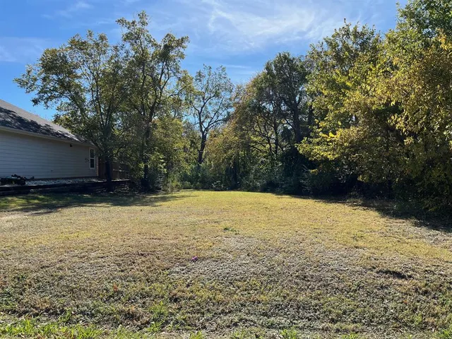 a view of outdoor space and yard