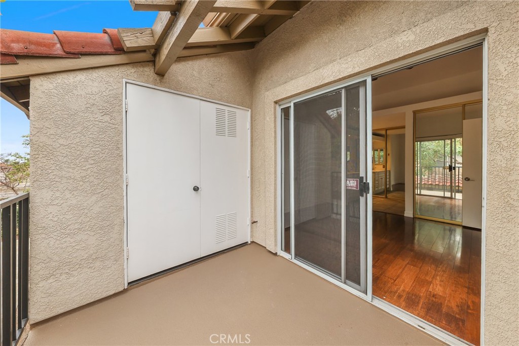 4 Dogwood Rancho Santa Margarita, CA 92688 - Photo 11 of 18 a view of a big room with wooden floor