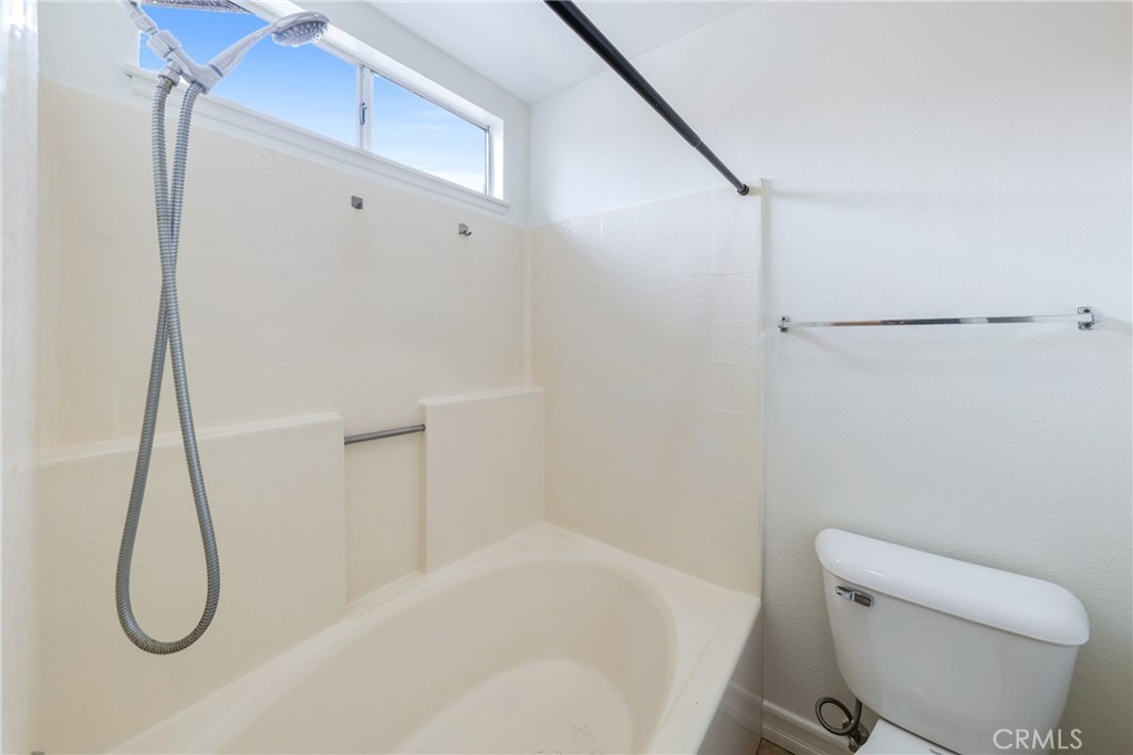 4 Dogwood Rancho Santa Margarita, CA 92688 - Photo 13 of 18 a bathroom with a toilet and a shower