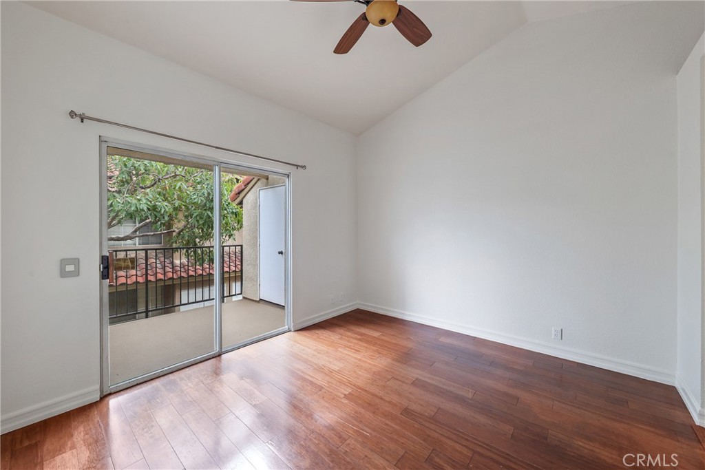 4 Dogwood Rancho Santa Margarita, CA 92688 - Photo 8 of 18 wooden floor in an empty room with a window