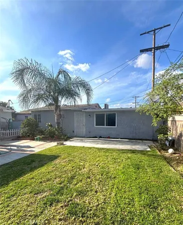 a house view with a swimming pool