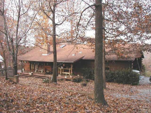 130 Anderson Jones Road Roxboro, NC 27573 - Photo 1 of 1 a front view of a house with garden