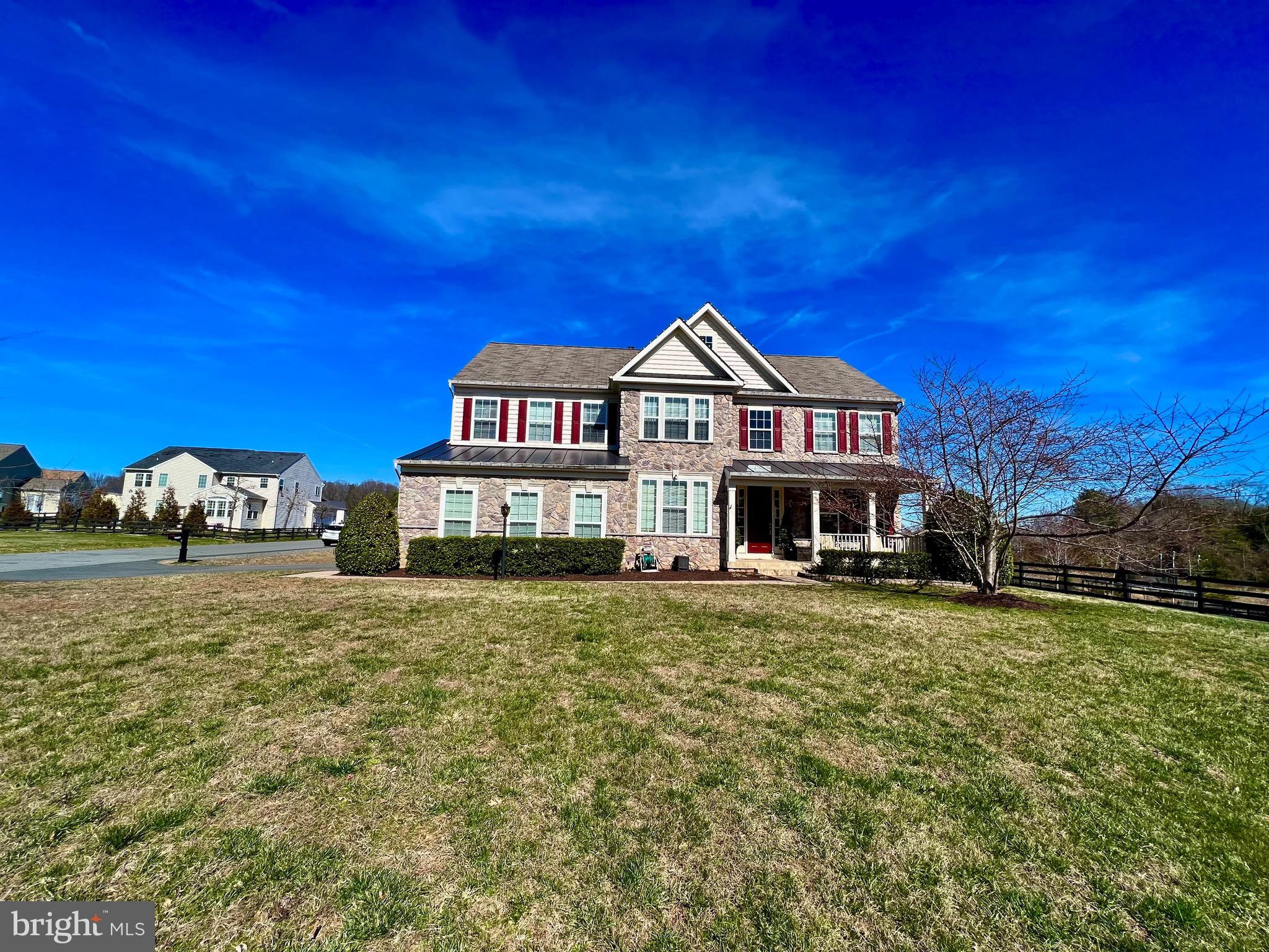 14637 Bridle Creek Road Woodbridge, VA 22193 - Photo 1 of 16 a view of a house with a big yard