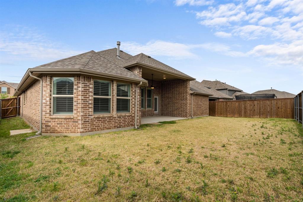 4220 Harper Avenue Celina, TX 75009 - Photo 19 of 20 a front view of a house with a yard