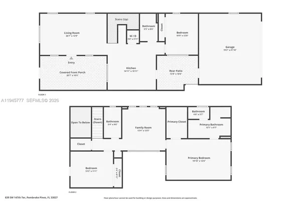 an aerial view of a house with a yard and lake view