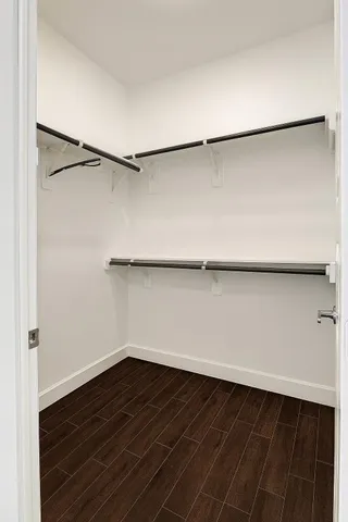 a view of an empty walk in closet