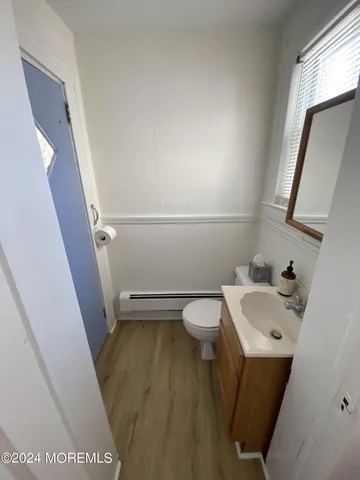 a bathroom with a sink and a toilet